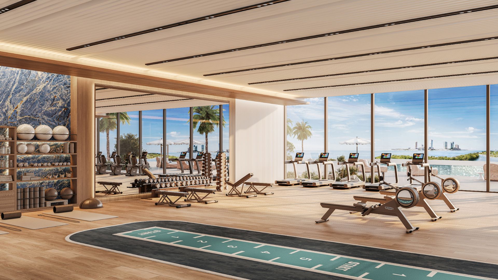 State-of-the-art fitness centre at Radisson Residences Al Reem Island Abu Dhabi overlooking the water